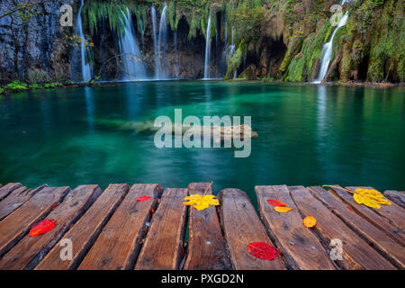 Plitvice Lakes. Image of waterfall located in Plitvice National Park, Croatia during autumn day. Stock Photo