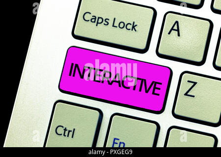 Writing note showing Interactive. Business photo showcasing Involving communication connection between showing or things. Stock Photo