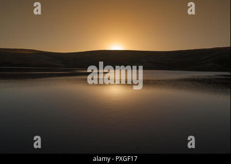 A view of Wessenden Head Reservoir, Saddleworth Moor at sunrise on October 22nd 2018. Stock Photo