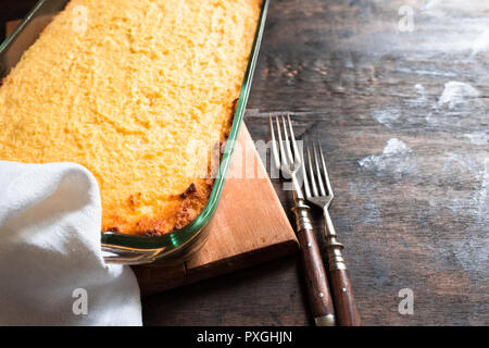 Fresh baked homemade cottage cheese casserole in a ceramic form. Healthy food/ Stock Photo