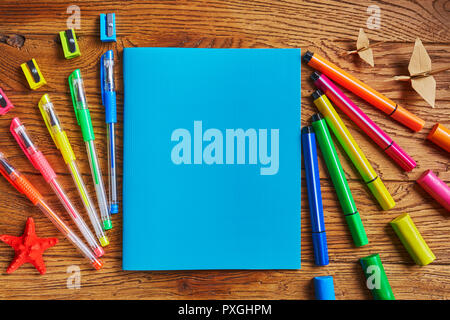 School stationery. In the center the notebook - a place for text Stock Photo