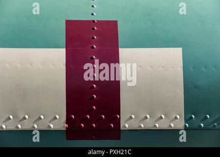 The texture of the metal of military equipment close-up shot. Stock Photo