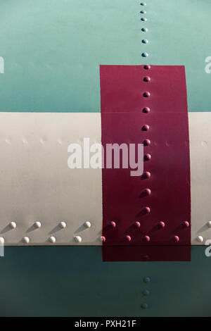 The texture of the metal of military equipment close-up shot. Stock Photo