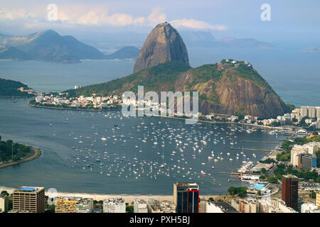 Sugarloaf Mountain or Pao de Acucar, the famous landmark of Rio de Janeiro view from Corcovado Hill in Rio de Janeiro, Brazil Stock Photo
