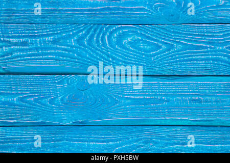 Background from wooden texture boards painted with bright blue paint. Stock Photo