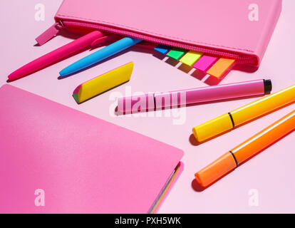 Colored stationery on a pink background. Education concepte. Stock Photo