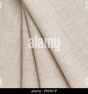 Texture canvas fabric as background. Texture fabric for feminine and men's shirts from flax. Stock Photo