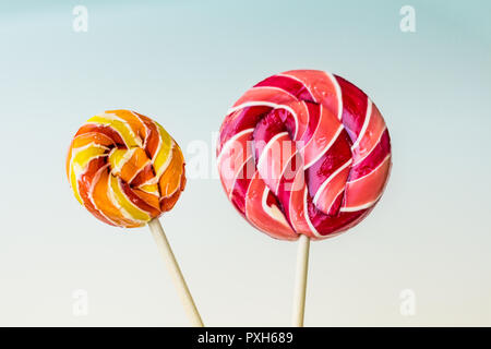 Colorful spiral lollipops isolated on white background Stock Photo
