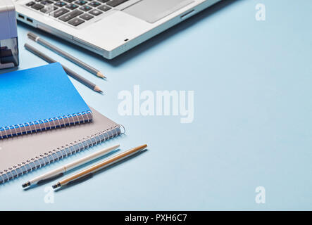 School supplies on the left side of the background Stock Photo