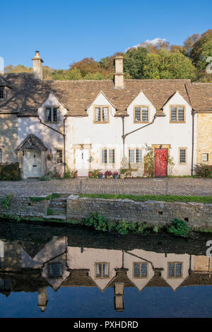 Cottages in Castle Combe in autumn. Castle Combe, Chippenham, Wiltshire, England Stock Photo