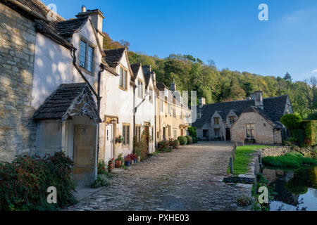 Cottages in Castle Combe in autumn. Castle Combe, Chippenham, Wiltshire, England Stock Photo