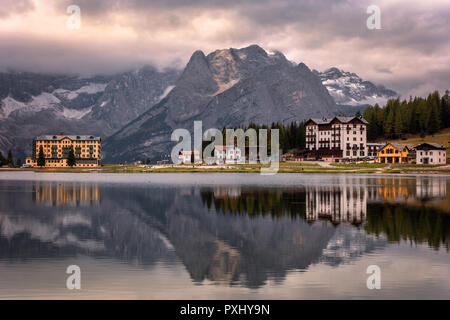 View of Punta Sorapis mountain of the Dolomites in the morning with the reflection on the famous lake Misurina at Cortina d'Ampezzo in Italy