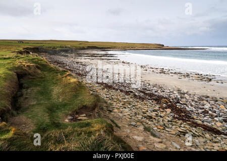 Sandy pebble beach in Orkney Stock Photo