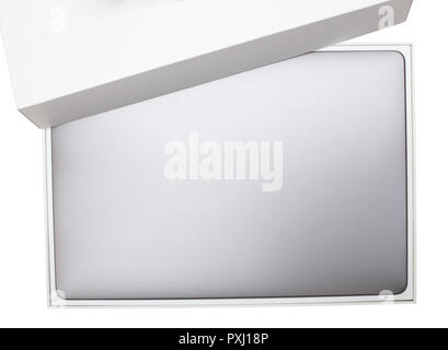 New high-speed thin grey aluminum laptop computer notebook top view with half open box isolated on a white background Stock Photo