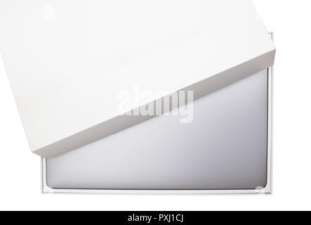 New high-speed thin grey aluminum laptop computer notebook top view with half open box isolated on a white background Stock Photo