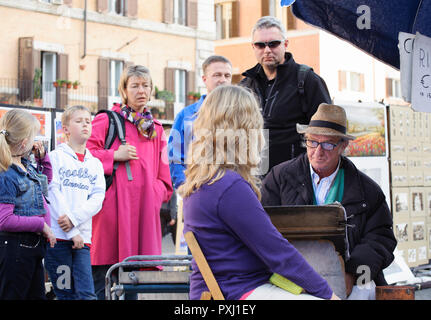 Artist drawing the portrait of a woman, Piazza Navona, Rome. Stock Photo