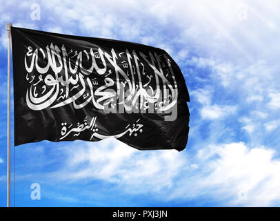 National flag of Al Nusra Front on a flagpole in front of blue sky. Stock Photo