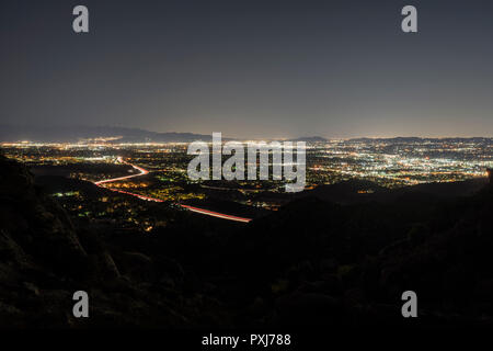 Los Angeles California night hilltop view of Porter Ranch and the 118 freeway in the San Fernando Valley.  Burbank, North Hollywood and the San Gabrie Stock Photo