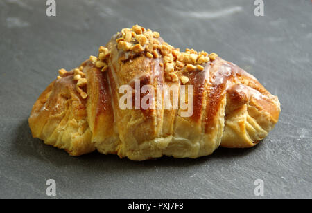 'Rogal świętomarciński' (Croissant Saint Martin in polish) - traditional pastries with white poppy seeds and nuts Stock Photo