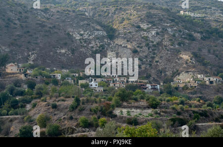 Kato Theletra or Old Theletra. The village was abandoned by its residents who relocated higher up the hillside after an earthquake caused landslide. Stock Photo