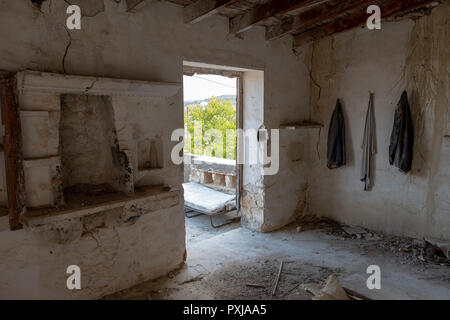 Kato Theletra or Old Theletra. The village was abandoned by its residents who relocated higher up the hillside after an earthquake caused landslide. Stock Photo