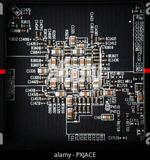 Electronic printed circuit board, digital background electronic hardware components Stock Photo