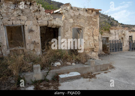 Kato Theletra or Old Theletra. The village was abandoned by its residents who relocated higher up the hillside after an earthquake caused landslide. Stock Photo