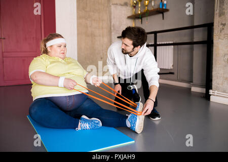 Overweight Woman Doing Sports Stock Photo