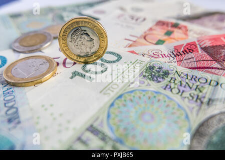 Euro, Polish zloty and British pound currencies background Stock Photo