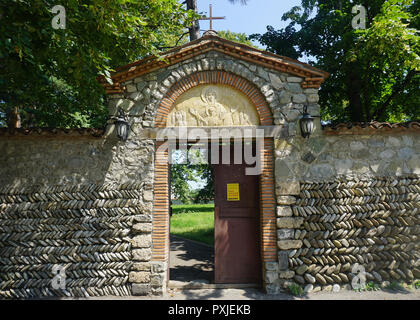 Telavi Akhali Shuamta Monastery Door Entrance with Holy Mother of God Welcome Carving Stock Photo
