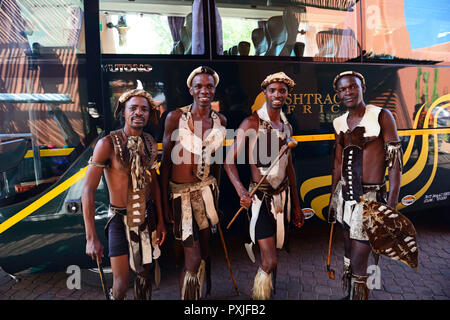 Dancers in traditional costumes welcome tourists at Avani Victoria Falls Resort, Livingstone, Zambia Stock Photo