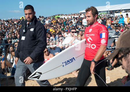PENICHE, PORTUGAL - OCTOBER 20, 2018: Joan Duru going to the ocean among the crowd of surf funs during the World Surf League's 2018 MEO Rip Curl Pro Portugal competition Stock Photo
