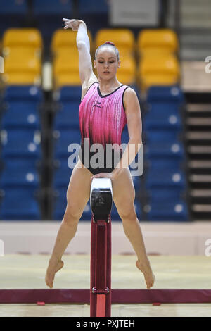 Doha, Qatar. 23rd Oct, 2018. SARAH VOSS from Germany practices on the balance beam during the first day of podium training before the competition held at the Aspire Dome in Doha, Qatar. Credit: Amy Sanderson/ZUMA Wire/Alamy Live News Stock Photo