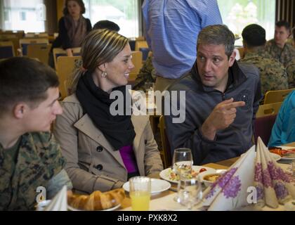 U.S. Representative Tim Ryan of Ohio and his wife Andrea Zetts eat a meal with Marines of Marine Rotational Force Europe 17.1 (MRF-E) at Vaernes Garnison, Norway, June 2, 2017. Marines and representatives discussed what life is like deployed to Norway. MRF-E galvanizes the Marine Corps’ long and close relationship with the Norwegian Armed Forces. Stock Photo