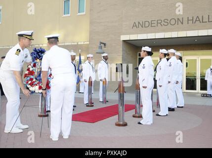 SAN ANTONIO (June 6, 2017) Capt. Brent Kelln, left, Navy Medicine Training Support Center (NMTSC) commanding officer, and Chief Hospital Corpsman Alexander Bransdorf, a surgical technician instructor assigned to NMTSC, prepare to lay the ceremonial wreath during a commemoration of the 75th Anniversary of the Battle of Midway at the Medical Education and Training Campus on board Joint Base San Antonio - Fort Sam Houston, Texas. NMTSC hosted the event which included remarks from Bransdorf as the guest speaker. Stock Photo