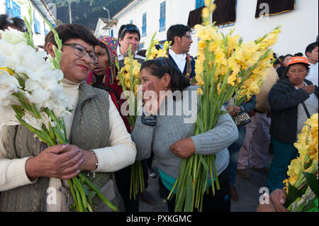 The next day of the Guerrilla Madonna is carried on the door of the church and bless the children. Stock Photo