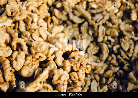 Top view of big shelled walnuts pile in farm market Stock Photo