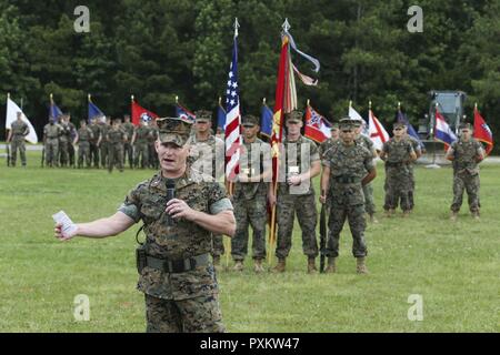 U.S. Marine Corps Lt. Col. Todd B. Sanders speaks at the Combat Logistics Battalion 22 change of command ceremony at Soifert Field on Camp Lejeune, N.C., June 16, 2017. During the ceremony, Sanders relinquished command to Lt. Col. Sean P. Mullen. Stock Photo