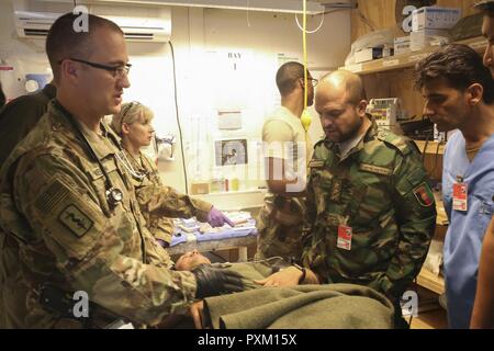 A U.S. Army Trauma Surgeon With 2nd Forward Surgical Team, U.S. Forces ...