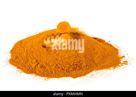 Curcuma powder with roots isolated on white Stock Photo