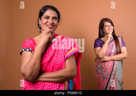 Portrait of two mature Indian woman wearing traditional clothes Stock Photo