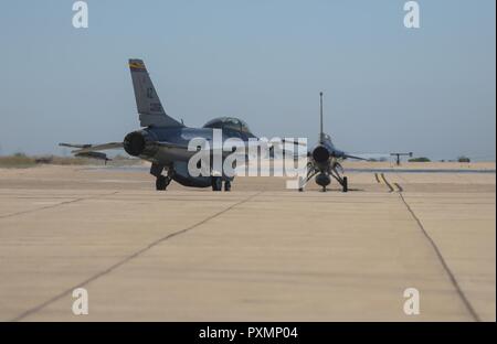 https://l450v.alamy.com/450v/pxmp04/two-f-16-fighting-falcons-with-the-21st-fighter-squadron-out-of-luke-air-force-base-ariz-taxi-to-the-runway-during-the-marine-division-tactics-course-at-marine-corps-air-station-miramar-calif-june-15-this-course-gives-pilots-air-to-air-combat-experience-and-the-tools-to-train-marines-in-their-squadrons-on-the-latest-tactics-pxmp04.jpg