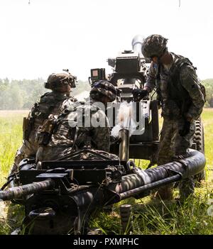 Soldiers with the 2nd Battalion, 122nd Field Artillery Regiment, 33rd ...