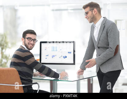 two businessmen analyzing stats financial data Stock Photo