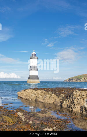 Trwyn Du Lighthouse at Penmon Point on the Isle of Anglesey Stock Photo