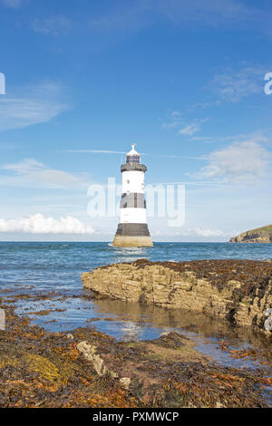 Trwyn Du Lighthouse at Penmon Point on the Isle of Anglesey Stock Photo