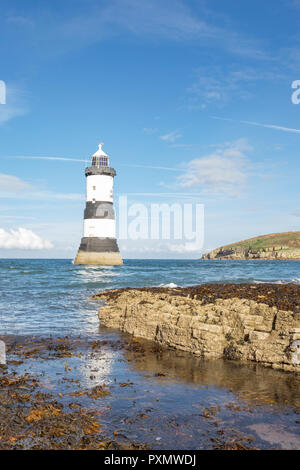 Trwyn Du Lighthouse at Penmon Point on the Isle of Anglesey Stock Photo