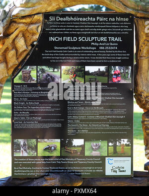 Sign at Inch field beside Cahir Castle showing the different wood carvings in the field. Cahir, County Tipperary, Ireland Stock Photo