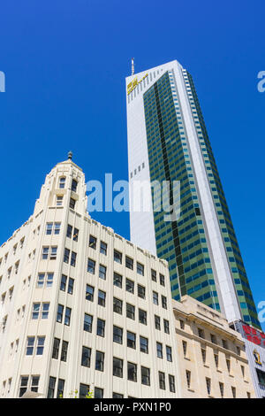 South32 Tower, stands above the heritage listed Gledden building in Perth, Western Australia Stock Photo