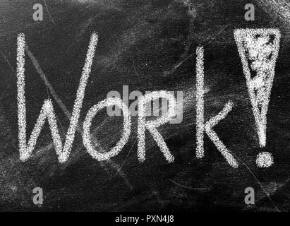 Business concept - work word on chalkboard Stock Photo